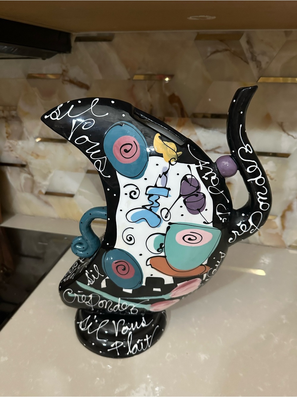 Whimsical painted ceramic coffee pot vase